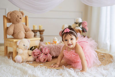 Close-up of teddy bear on bed at home