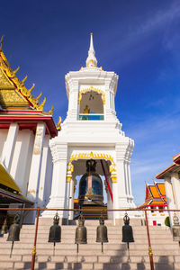 Low angle view of bell tower outside temple