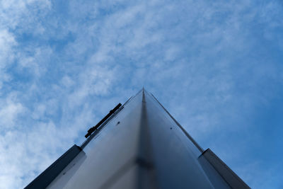 Low angle view of building against blue sky