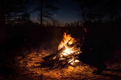 View of bonfire at night
