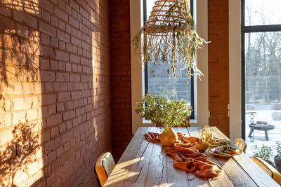 Potted plants on table at home