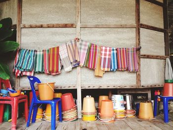 Fabrics and buckets for sale at market