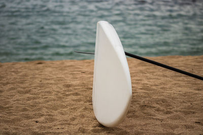 Close-up of white surf on beach