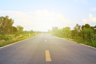 Empty road against sky