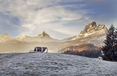 Scenic view of snowcapped mountains against sky