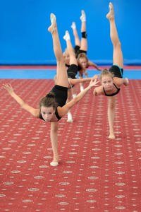 Ballet dancers dancing at ballet studio