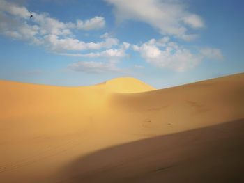 Scenic view of desert against sky