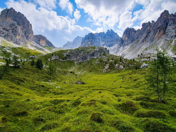 Scenic view of landscape and mountains against sky