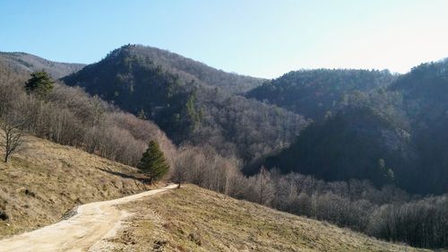 Scenic view of mountains against clear sky