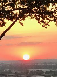 Scenic view of silhouette landscape against romantic sky at sunset