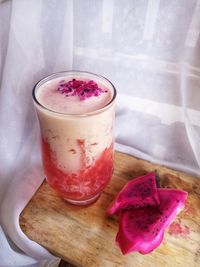 Close-up of ice cream in glass on table