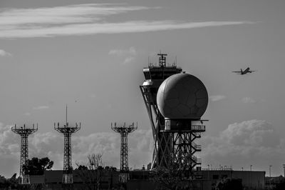 Low angle view of air traffic control tower against sky