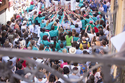 High angle view of people on street in city