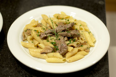 Close-up of pasta in bowl on table