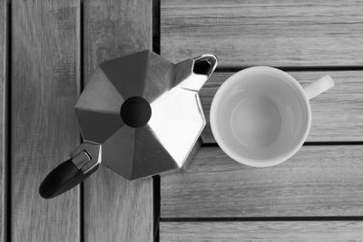 High angle view of coffee cup on table