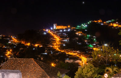 High angle view of illuminated buildings at night