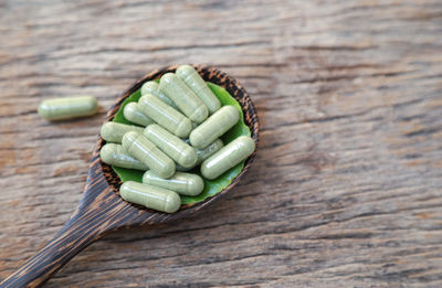 Directly above shot of green leaf on table