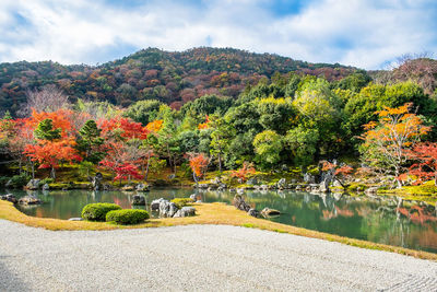 Scenic view of lake against sky during autumn