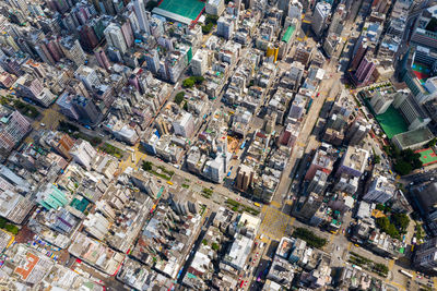 High angle view of city buildings against sky