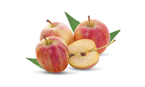 Close-up of apples against white background