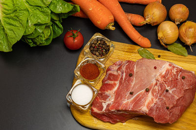 High angle view of fruits on cutting board