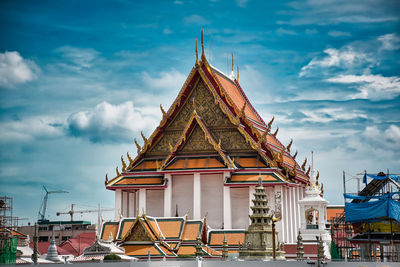 Low angle view of temple building against sky