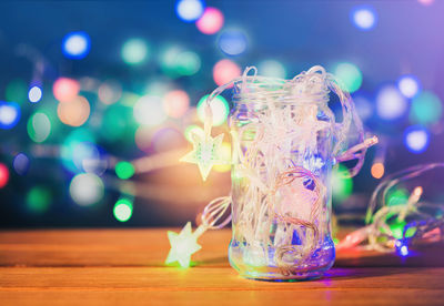 Close-up of glass jar on table