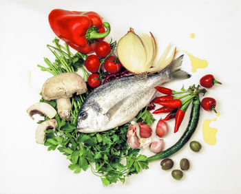 Close-up of fruit over white background