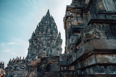 Low angle view of temple against building