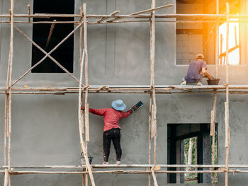 Manual workers working at construction site