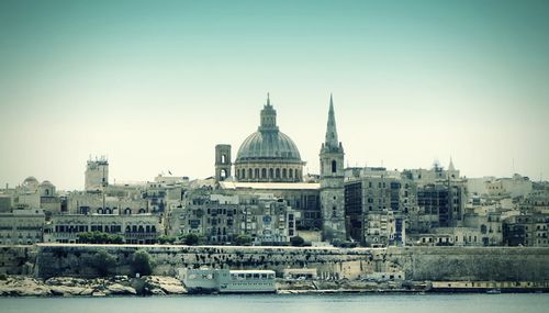 View of cityscape against clear sky