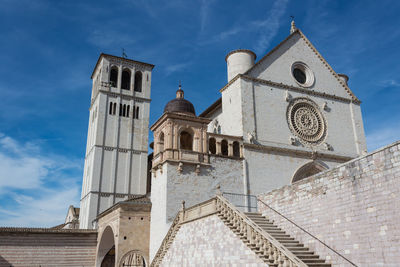 Low angle view of bell tower against sky