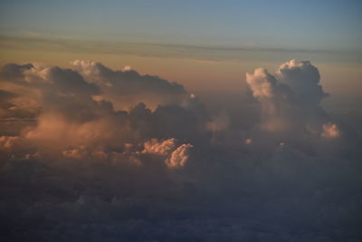 Low angle view of clouds in sky during sunset