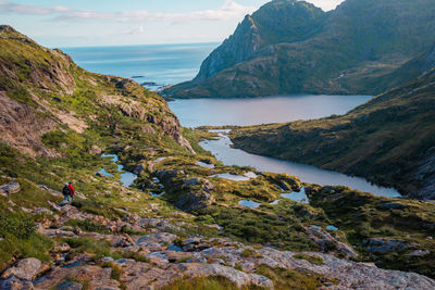 Scenic view of mountains, lakes and ocean against sky, lofoten, norway