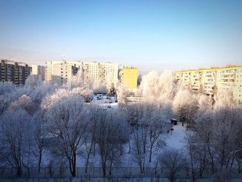 Panoramic view of city buildings against clear sky