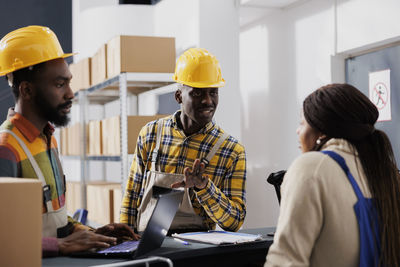 Architects working in office