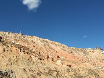 Low angle view of mountain against clear blue sky