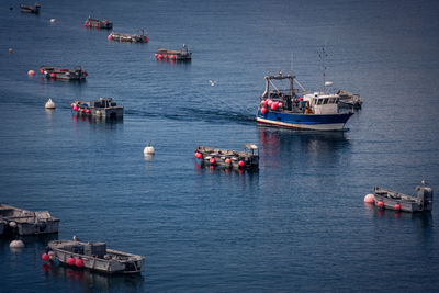 High angle view of boats moored in sea