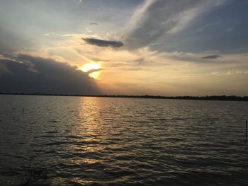 Scenic view of sea against sky during sunset