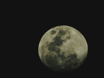 Scenic view of moon against black sky