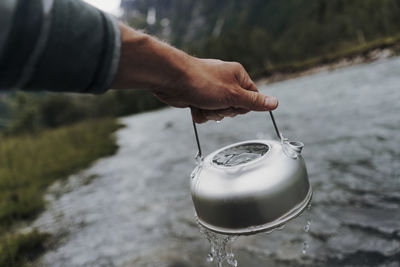 Man holding glass of water