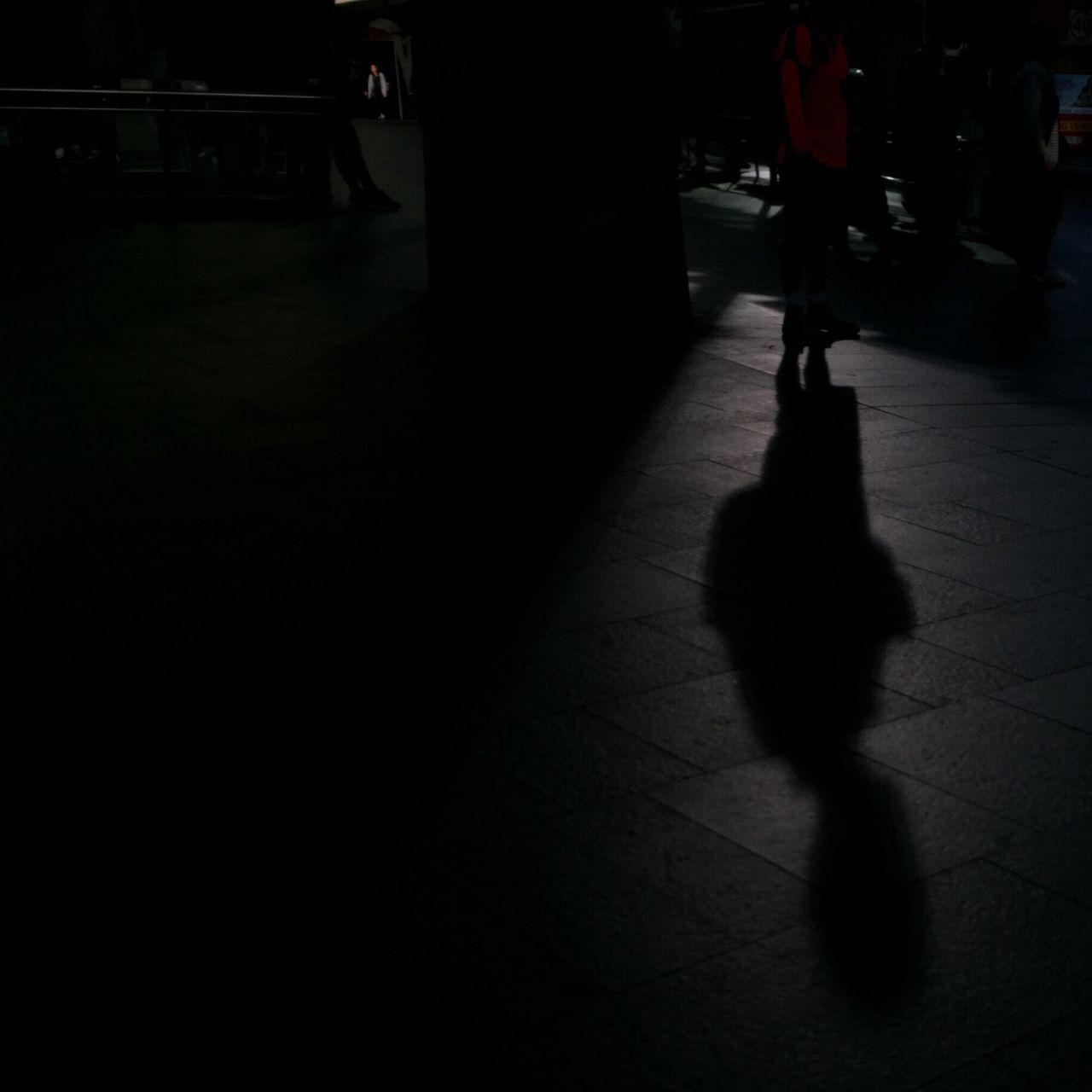 shadow, walking, street, night, lifestyles, men, silhouette, person, leisure activity, sunlight, city life, full length, city, road, sidewalk, outdoors, transportation, unrecognizable person