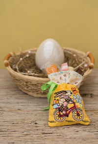 Close-up of eggs in basket on table