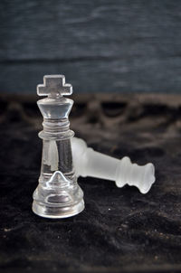 Close-up of chess pieces on table