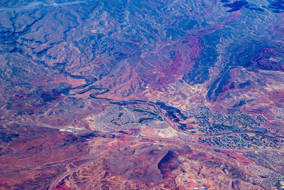 Aerial view of rocky mountains on sunny day