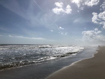 Scenic view of beach against sky