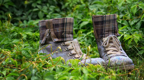 Low section of shoes on ground