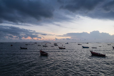 Scenic view of sea against sky at sunset