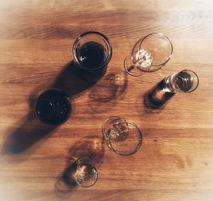 High angle view of wine glasses on table