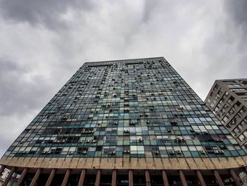 Low angle view of modern building against sky